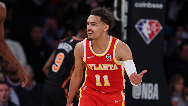 Trae Young reacts after a basket against the Knicks.